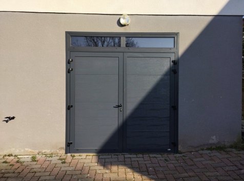 Porte de garage, porte d'entrée, volets et fenêtres à Senones